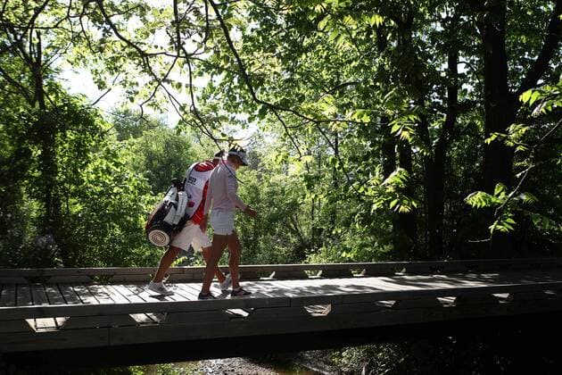 May 29, 2016 - Ann Arbor, Michigan, United States - Belen Mozo of Spain and caddie walk across the foot bridge to the18th tee during the final round of the inaugural LPGA Golf Damen Volvik Championship at Travis Pointe Country Club in Ann Arbor, MI, USA Sunday, May 29, 2016. LPGA Volvik Championship - Final Round  - ZUMAn230