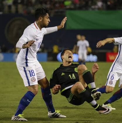 June 01, 2016: Chilean 18 Gonzalo Jara takes down Mexican Forward 14 Javier Chicharito Hernandez during an international soccer match between Mexico and Chile at Qualcomm Stadium in San Diego, California. Mexico defeats Chile 1-0. Soccer 2016: Mexico vs Chile JUN 01 - ZUMAc04_