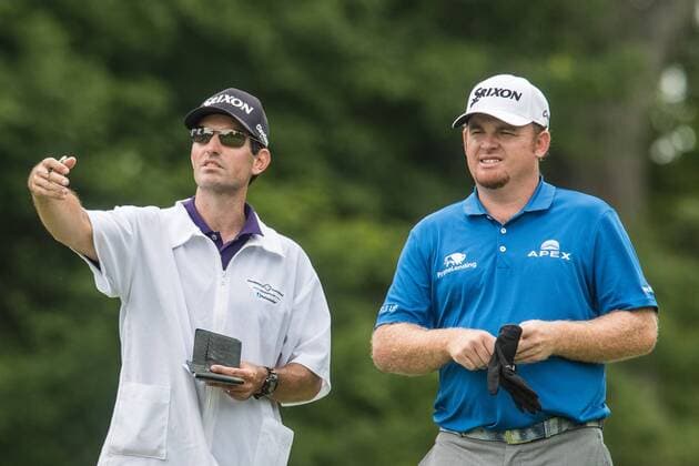 June 4, 2016 - Dublin, Ohio, U.S - J.B. Holmes and his caddie look over th 18th fairway during the third round of The Memorial Tournament at Muirfield Village Golf Club, Dublin, Ohio. Golf 2016 - The Memorial Tournament - Third Round - ZUMAs304