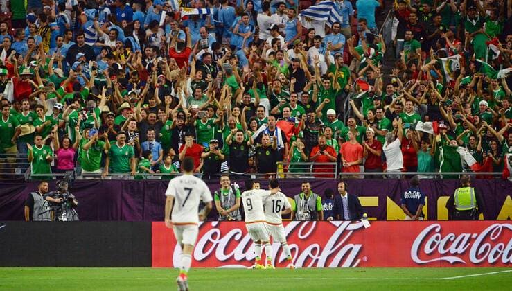 Mexico s Hector Herrera (16) celebrates after scoring the third Mexico goal of the match in as the mostly Mexico fans crowd reacts the second half of the Mexico-Uruguay match during the COPA America Centenario at University of Phoenix Stadium in Glendale, Arizona, June 5, 2016.  PXP20160605013 ARTxFOXALL
