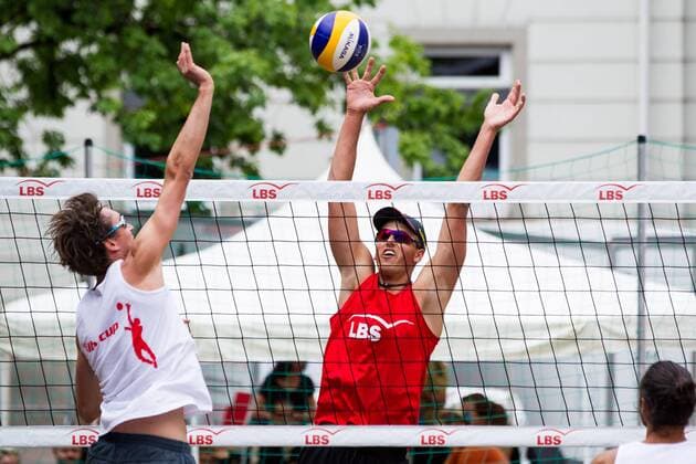 Angriff Florian Schweikart (DJK Augsburg Hochzoll) - Block Mirko Schneider (TSV Georgii Allianz Stuttgart); LBS-Cup Beachvolleyball A-Top, Markplatz, Schopfheim Germany, 20160605; Schopfheim Copyright: Wuechnerx xEibner-Pressefoto EP_nwr