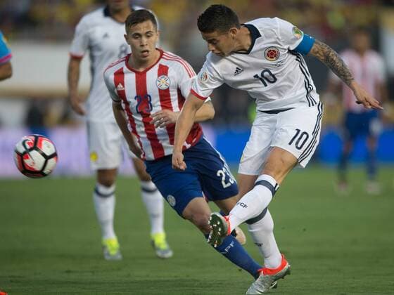 PASADENA, June 7, 2016 -- Colombia s James Rodriguez (R) shoots during the Copa America Centenario Group A match between Colombia and Paraguay at Rose Bowl Stadium in Pasadena, California, the United States, June 7, 2016. ) (SP)U.S.-PASADENA-COPA AMERICA-GROUP A-COL VS PAR YangxLei 