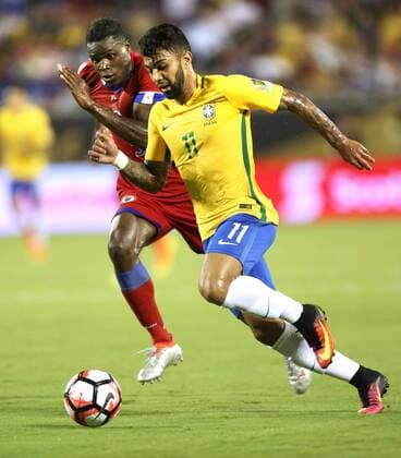 June 8, 2016 - Orlando, FL, USA - Brazil s Gabriel Barbosa (11) passes Haiti s Romain Genevois in Copa America group stage action at Camping World Stadium in Orlando, Fla., on Wednesday, June 8, 2016. Brazil won, 7-1. Copa America: Brazil vs. Haiti in Orlando - ZUMAm67_