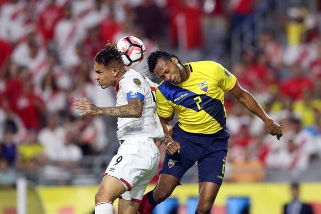 Copa America, Ecuador - Peru 08 June 2016: Ecuador midfielder Fidel Martinez 9 and Peru defender Alberto Rodriguez 2 fight for a loose ball during the first half of the Copa America Centanario game at University of Phoenix Stadium in Glendale, Az. SOCCER: JUN 08 Copa America Centenario - Ecuador v Peru Icon3171606080410 EDITORIAL USE ONLY