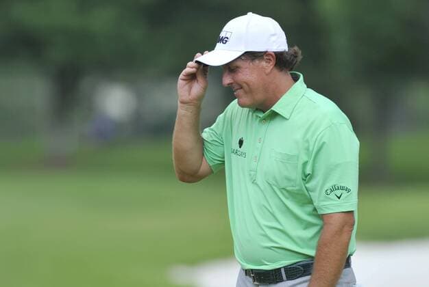 June 11, 2016: Phil Mickelson smiles after completing his putt on the 16th green during the third round of the FedEx St. Jude Classic at TPC Southwind in Memphis, Tennessee. Austin McAfee CSM PGA Golf Herren 2016: FedEx St. Jude Classic JUNE 11 - ZUMAc04_