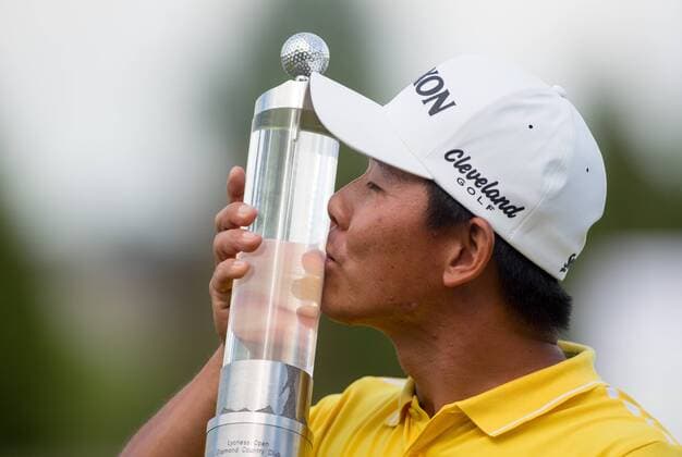 GOLF - Lyoness Open 2016 ATZENBRUGG,AUSTRIA,12.JUN.16 - GOLF - PGA Golf Herren European Tour - Lyoness Open, award ceremony. Image shows the rejoicing of Ashun Wu (CHN). Keywords: trophy. GEPAxpictures xMaticxKlansek