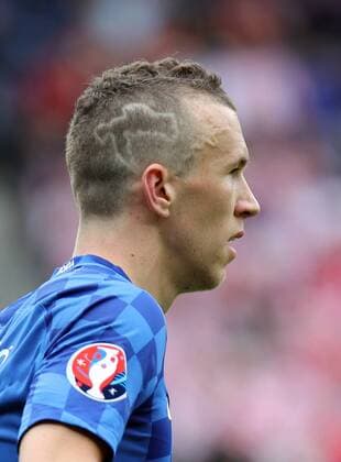 Bilder des Tages - Sport UEFA Frankreich Euro 2016 TUR vs CRO EM EURO Nationalteam Länderspiel 12.06.2016, Fussball, UEFA EURO EM Europameisterschaft Fussball 2016, Türkei - Kroatien (0:1): Ivan Perisic (Kroatien) mit Umrissen des Landes Kroatien im Haar.