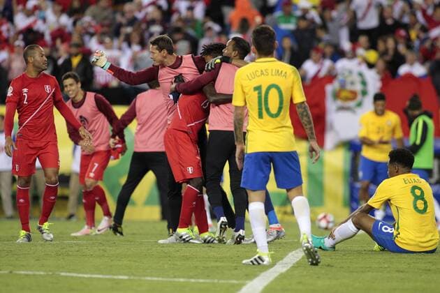 Brazil midfielder Lucas Lima (10) and midfielder Elias (9) look on as Peru celebrates after defeating Brazil 1-0 in the 2016 Copa America Centenario Group B match at Gillette Stadium in Foxborough, Massachusetts on June 12, 2016.  BOS2016061221 MATTHEWxHEALEY