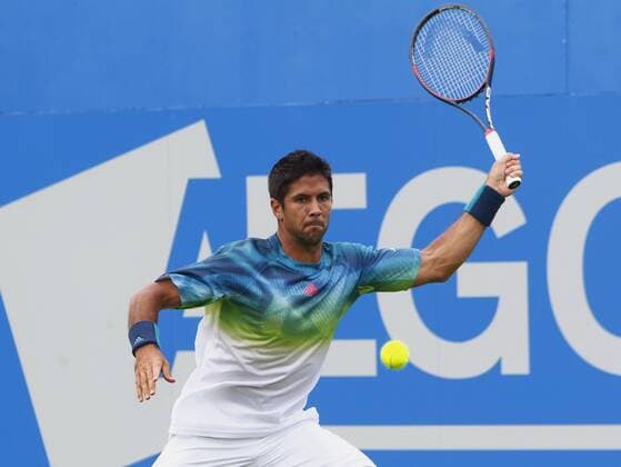14.06.2016. Queens Club, London, England. Aegon Queens Tennis Championships Day Two. Fernando Verdasco (ESP) returns in his 1st round match against number 2 seed, Stan Wawrinka (SUI). xAlanxMartinx  ActionPlus11749033