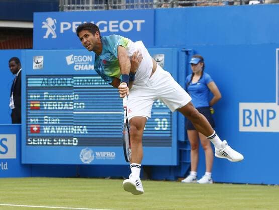 14.06.2016. Queens Club, London, England. Aegon Queens Tennis Championships Day Two. Fernando Verdasco (ESP) serves in his 1st round match against number 2 seed, Stan Wawrinka (SUI). xAlanxMartinx  ActionPlus11749034