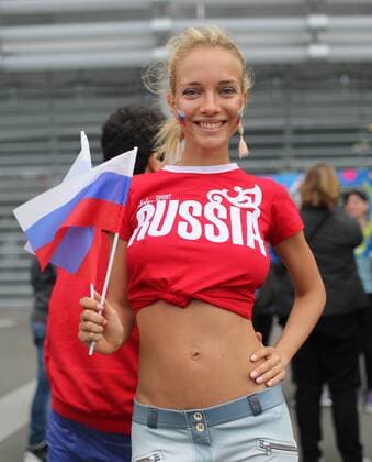 A Russian girl fan with flags during the UEFA European Championship EM Europameisterschaft 2016 match at the Stadium Pierre Mauroy, Lille. Picture date June 15th, 2016 Pic David Klein Sportimage EDITORIAL USE ONLY. No use with unauthorised audio, video, data, fixture lists, club league logos or live services. Online in-match use limited to 120 images, no video emulation. No use in betting, games or single club league player publications.