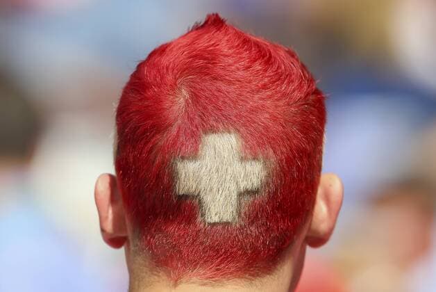 schweitzer Fan, Fans, Fussballfans, supporters, spectators, Zuschauer, Jacke, Kutte, Weste, Fankurve Bemalung im Gesicht, Gesichtsbemalung, Schminke Haare, Frisur, Styling, Hair, Gel, Mode, Haarschnitt nationalflagge, Nationalfahne, Nationalfarben, zeigt die Rote Karte, Platzverweis, schweres Vergehen weiss Flagge, fahne SWITZERLAND - ROMANIA Group A ,Football European Championships EURO at June 15, 2016 in Paris, Parc des Princes. Fussball, Rumaenien Schweiz Nationalteam, EM,