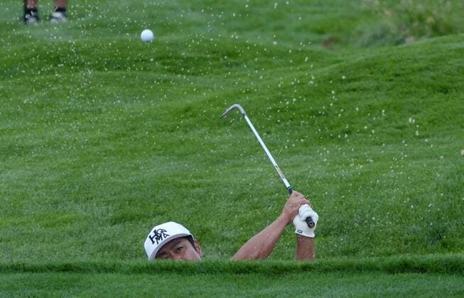 Japan s Hideto Tanihara hits from the sand trap on the 15th hole during the first round of the U.S. Open golf championship at Oakmont Country Club near Pittsburgh, Pennsylvania on Thursday, June 16, 2016.  OAK20160616109 PATxBENIC