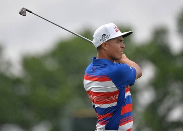 Rickie Fowler watches his shot on the 12th fairway during the first round of the 2016 U.S. Open at Oakmont Country Club in Oakmont, Pennsylvania on June 16, 2016.  OAK20160616334 KEVINxDIETSCH