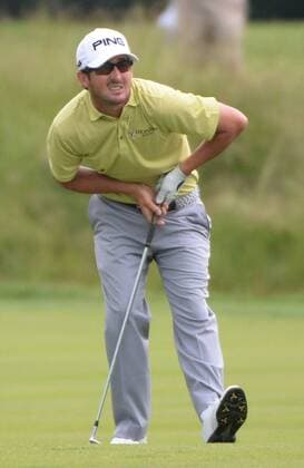 Andrew Landry, of Austin, Texas, uses body English to keep his ball on the green as he plays his shot to his final hole (9th) during the first round of the U.S. Open golf championship at Oakmont Country Club near Pittsburgh, Pennsylvania on Thursday, June 16, 2016. The ball stayed on the green and he has an eight foot putt for a birdie, but play was suspended for the day due to rain. Landry is atop the leaderboard at three under par.  OAK20160616115 PATxBENIC