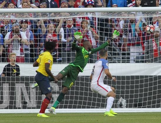 USA s Clint Dempsey (8) heads the ball for a goal past Ecuador goalie Alexander Dominguez in a 2016 Copa America Centenario soccer quarterfinals at CenturyLink Field in Seattle, Washington on June 16, 2016. USA beat Ecuador 2-1 to advance to the semi-finals.  SEA2016061160 JIMxBRYANT