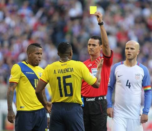USA Ecuador s Antonio Valencia (16) receives a yellow card from Referee Wilmar Roldan during their game against USA in a 2016 Copa America Centenario soccer quarterfinals at CenturyLink Field in Seattle, Washington on June 16, 2016. USA beat Ecuador 2-1 to advance to the semi-finals.  SEA2016061612 JIMxBRYANT