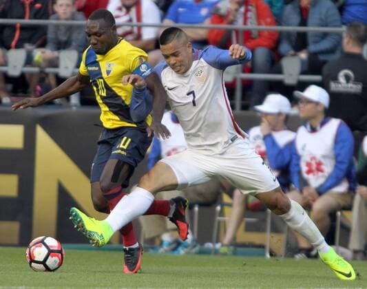 USA; s Bobby Wood (7) kicks the ball away from Ecuador s Walter Ayovi (10) in a 2016 Copa America Centenario soccer quarterfinals at CenturyLink Field in Seattle, Washington on June 16, 2016. USA beats Ecuador 2-1 to advance to the semi-finals.  SEA2016061616 JIMxBRYANT