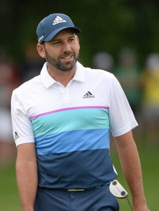 Spain s Sergio Garcia smiles as he saves par on the first hole if his first round during the Friday round of the U.S. Open golf championship at Oakmont Country Club near Pittsburgh, Pennsylvania on June 17, 2016. Garcia was just starting his first round due to the rain delays yesterday and will play his second 18 later today.  OAK20160617104 PATxBENIC