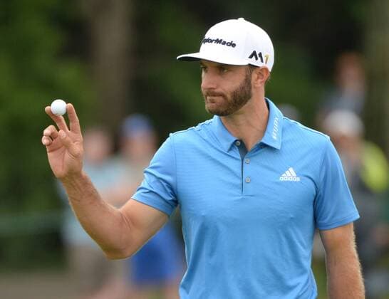 Dustin Johnson is pleased as he saves par on the on the first hole of his first round during the Friday round of the U.S. Open golf championship at Oakmont Country Club near Pittsburgh, Pennsylvania on June 17, 2016. Johnson was just starting his first round due to the rain delays yesterday and will play his second 18 later today.  OAK20160617109 PATxBENIC