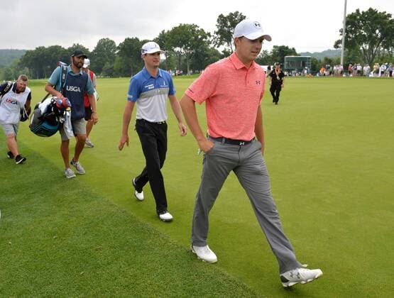 Jordan Spieth (R) and Zach Johnson (C) walks off after finishing their first round at the 2016 U.S. Open at Oakmont Country Club in Oakmont, Pennsylvania on June 17, 2016.  OAK20160617307 KEVINxDIETSCH