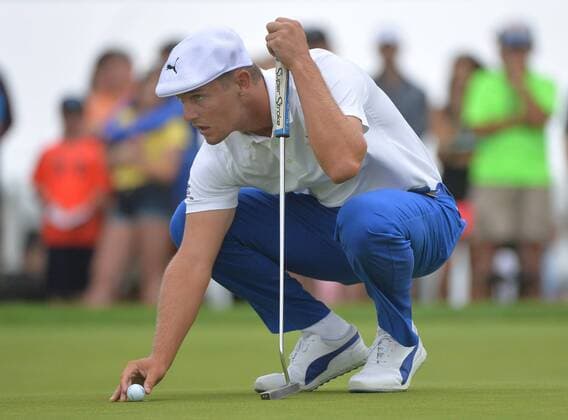 Bryson DeChambeau lines up a putt on the 9th green during the 2016 U.S. Open at Oakmont Country Club in Oakmont, Pennsylvania on June 17, 2016.  OAK20160617310 KEVINxDIETSCH