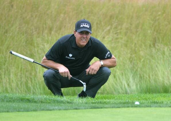 Phil Mickelson putts on the 12th green at the 2016 U.S. Open at Oakmont Country Club in Oakmont, Pennsylvania on June 17, 2016.  OAK20160617325 KEVINxDIETSCH