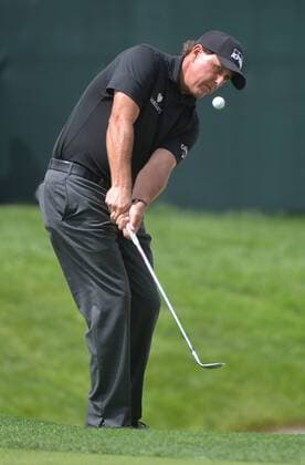 Phil Mickelson chips onto the 12th green during the U.S. Open at Oakmont Country Club in Oakmont, Pennsylvania on June 17, 2016.  OAK20160617317 KEVINxDIETSCH