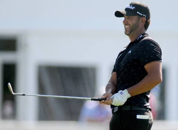 Scott Piercy watches his approach shot roll towards the flag on the 17th green U.S. Open at Oakmont Country Club in Oakmont, Pennsylvania on June 17, 2016.  PIT20160617306 ARCHIExCARPENTER