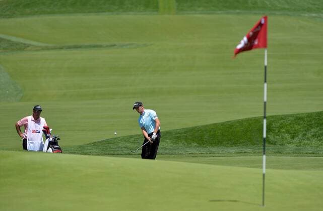 Gregory Bourdy of France hits on the 18th fairway during his second round at the U.S. Open at Oakmont Country Club near Pittsburgh, Pennsylvania on June 18, 2016.  OAK20160618208 KEVINxDIETSCH