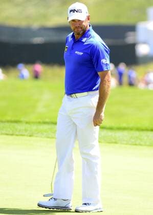 Lee Westwood reacts as he misses his punt on the 11th at the U.S. Open golf championship at Oakmont Country Club near Pittsburgh, on June 17, 2016. Lee Westwood goes on to record a boogie on the hole.  OAK20160618312 ARCHIExCARPENTER