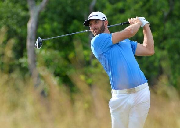 A gallery of people watch Dustin Johnson hits a tee shot on the 4th hole in the 3rd round at the U.S. Open at Oakmont Country Club near Pittsburgh, Pennsylvania on June 18, 2016.  OAK20160618902 KEVINxDIETSCH