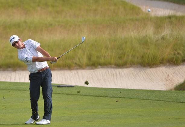 Patrons watch Andrew Landry hit an iron on the 3rd hole hole in the 3rd round at the U.S. Open at Oakmont Country Club near Pittsburgh, Pennsylvania on June 18, 2016.  OAK20160618909 KEVINxDIETSCH