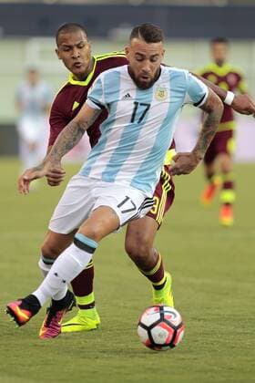 Argentina defender Nicholas Otamendi (17) steals the ball from Venezuela forward Salomon Rondon (9) in the first half of the 2016 Copa America Centenario quarterfinal match at Gillette Stadium in Foxborough, Massachusetts on June 18, 2016. Argentina defeated Venezuela 4-1.  BOS2016061816 MATTHEWxHEALEY
