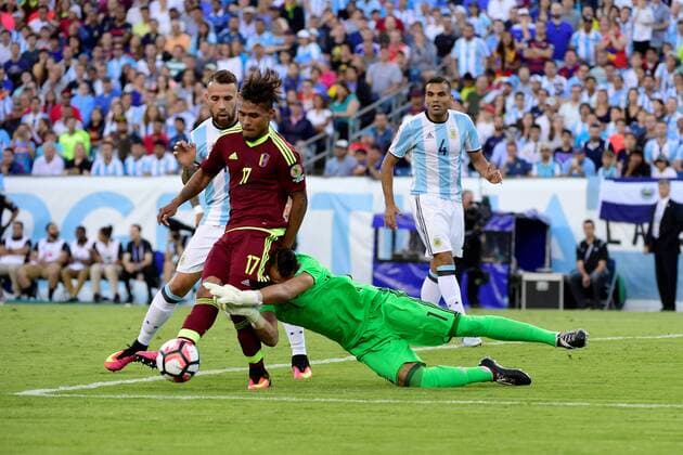 Saturday, June 18, 2016: Argentina goalkeeper Sergio Romero (1) charges into Venezuela forward Josef Martinez (17) for the ball during the Copa America Centenario quarterfinal soccer match between Argentina and Venezuela held at Gillette Stadium in Foxborough, Massachusetts. Argentina defeats Venezuela 4-1. SOCCER 2016: Copa America Centenario Argentina vs Venezuela JUN 18 - ZUMAc04_