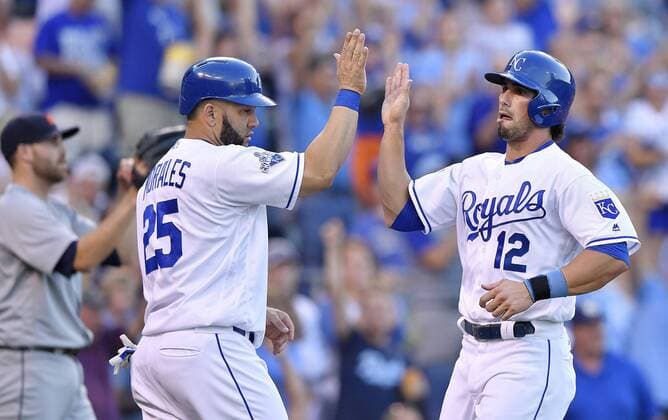 June 18, 2016 - Kansas City, MO, USA - The Kansas City Royals Kendrys Morales (25) and Brett Eibner (12) greet each other in front of Detroit Tigers pitcher Matt Boyd after scoring on a two-run double by Whit Merrifield in the second inning at Kauffman Stadium in Kansas City, Mo., on Saturday, June 18, 2016. Detroit at Kansas City - ZUMAm67_