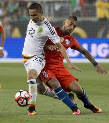 Chile s Arturo Vidal (8) collides with Mexico s Paul Aguilar (22) in the second half at COPA America Centenario quarter-finals at Levi s Stadium in Santa Clara, California on June 18, 2016. Chile annihilated Mexico 7-0.  SXP2016061820 TERRYxSCHMITT