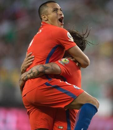 Alexis Sanchez (L) of Chile celebrates scoring during the quarterfinal match against Mexico of 2016 Copa America soccer tournament at the Levi s Stadium in Santa Clara, California, the United States, June 18, 2016. Chile won 7-0. Yang Lei)(wll) (SP)US-SANTA CLARA-SOCCER-COPA AMERICA-QUARTERFINAL-MEX VS CHI YangxLeixC 