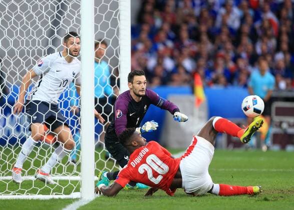 EURO 2016, Schweiz - Frankreich Switzerland s Johan Djourou sees his shot saved by France s Hugo Lloris during the UEFA European Championship EM Europameisterschaft 2016 match at the Stade Pierre-Mauroy, Lille. Picture date June 19th, 2016 Pic David Klein Sportimage EDITORIAL USE ONLY. No use with unauthorised audio, video, data, fixture lists, club league logos or live services. Online in-match use limited to 120 images, no video emulation. No use in betting, games or single club league player publications.