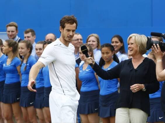19.06.2016. Queens Club, London, England. Aegon Queens Tennis Championships Day Seven. Andy Murray (GBR) makes a joke with BBC tennis commentator Sue Barker after his win over Milos Raonic (CAN) in the final at Queens. Murray has now won the event for a record fifth time. Andy Murray won in three sets 6-7 6-4 6-3 . xAlanxMartinx  ActionPlus11751952