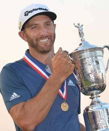 Dustin Johnson holds the Championship Trophy on the 18th green after winning his first major championship in the final round at the U.S. Open at Oakmont Country Club near Pittsburgh, Pennsylvania on June 19, 2016. Johnson won with a score of 5 under par.  OAK20160619895 KEVINxDIETSCH