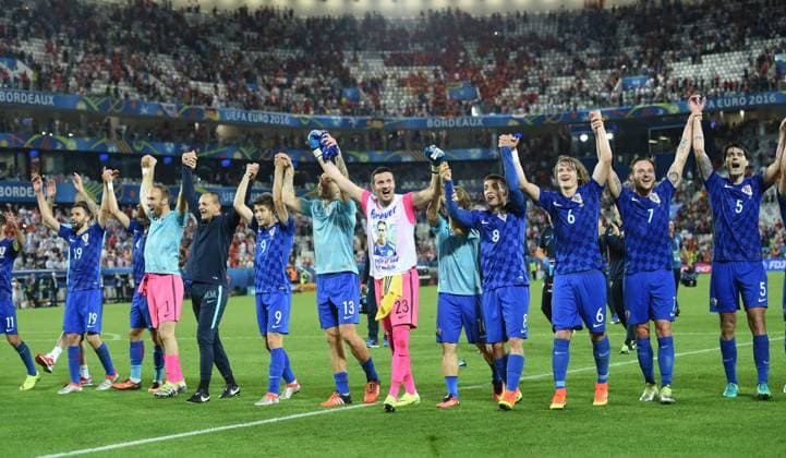 Players of Croatia celebrate victory after the Euro 2016 Group D soccer match between Spain and Croatia in Bordeaux, France, June 21, 2016. Croatia won 2-1. ) (SP)FRANCE-BORDEAUX-SOCCER-EURO 2016-GROUP D-SPAIN VS CROATIA TaoxXiyi 