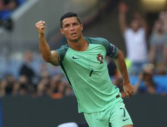 Cristiano Ronaldo of Portugal celebrates scoring his sides second goal during the UEFA European Championship EM Europameisterschaft 2016 match at the Stade de Lyon, Lyon. Picture date June 22nd, 2016 Pic Phil Oldham Sportimage EDITORIAL USE ONLY. No use with unauthorised audio, video, data, fixture lists, club league logos or live services. Online in-match use limited to 120 images, no video emulation. No use in betting, games or single club league player publications.