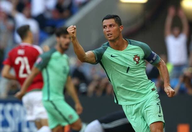 Cristiano Ronaldo of Portugal celebrates scoring his sides second goal during the UEFA European Championship EM Europameisterschaft 2016 match at the Stade de Lyon, Lyon. Picture date June 22nd, 2016 Pic Phil Oldham Sportimage EDITORIAL USE ONLY. No use with unauthorised audio, video, data, fixture lists, club league logos or live services. Online in-match use limited to 120 images, no video emulation. No use in betting, games or single club league player publications.