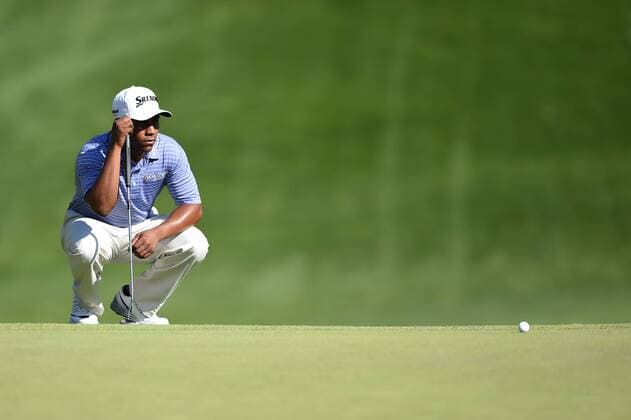 June 25, 2016 - Harold Varner III eyes up his putt on number seventeen during third round play at the Quicken Loans National at Congressional Country Club in Bethesda MD. PGA Golf Herren 2016: Quicken Loans National JUN 25 - ZUMAcjm_