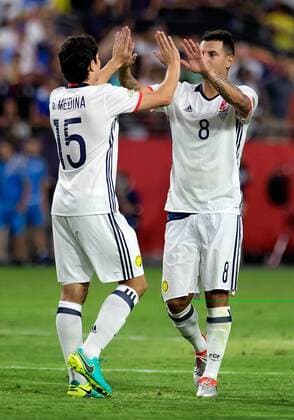 25 June 2016: Colombia defender Stefan Medina (15) and midfielder Edwin Cardona (8) high five each other after Colombia defeated the United States, 1-0, during the Copa America Centenario third place game at the University of Phoenix Stadium in Glendale, Ariz. (Photo by Carlos Herrera Icon Sportswire) SOCCER: JUN 25 JUN 25 Copa America Centenario - Third Place - United States v Colombia Icon1606251099 EDITORIAL USE ONLY