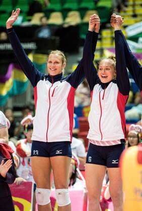 June 26, 2016 - Hong Kong, Hong Kong S.A.R, China - The USA team on the podium after their win. L to R CHRISTA HARMOTTO DIETZEN and CARLI LLOYD.FIVB Volleyball World Grand Prix Hong Kong 2016. USA secure a 3-0 win over China at the Hong Kong Coliseum with scores of 25-19,25-21,25-17 USA beat China in the women FIVB Volleyball World Grand Prix Hong Kong 2016 - ZUMAr144