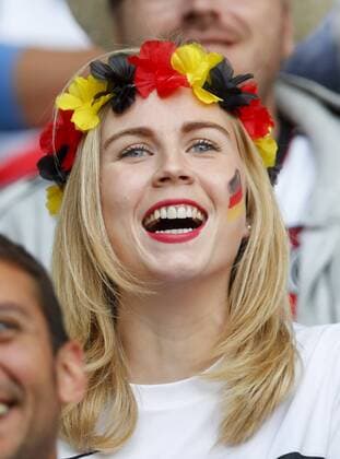 Fan, Fans, Fussballfans, supporters, spectators, Zuschauer, Jacke, Kutte, Weste, Fankurve, Schals Fanschals, Maske, Verkleidung, Bemalung im Gesicht, Gesichtsbemalung, Schminke junge hübsche Frau, Maedchen, sexy, aufreizend, Figur, hübsch, lacht, attraktiv, Mode, fashion, Schmuck, Tasche, Schminke, GERMANY - SLOVAKIA 3-0 Best of 16 ,Football European Championships EURO at 26th of June, 2016 in Lille, France. Fussball, Nationalteam,Deutschland, Slowakei, Achtelfinale