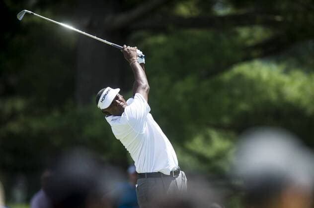 Vijay Singh of Fiji, plays his tee shot on the 2nd hole at Congressional CC during the final round of the Quicken Loans National golf tournament in Bethesda, Maryland on Sunday, June 36, 2016. Billy Hurley III, of Annapolis Maryland, shot a 2-under 69 on Sunday for his first tournament win.  WAP201606260029 PETExMAROVICH