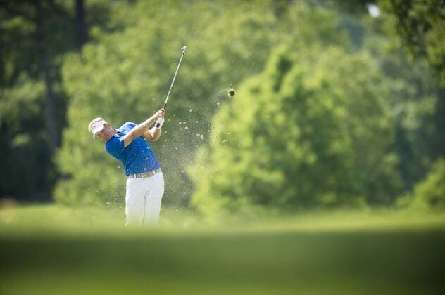 Billy Hurley III plays his approach shot to the 9th hole at the Quicken Loans National golf tournament at Congressional CC in Bethesda, Maryland on Sunday, June 36, 2016. Hurley, of Annapolis, Maryland, shot a 2-under 69 on Sunday for his first tournament win.  WAP201606260393 PETExMAROVICH